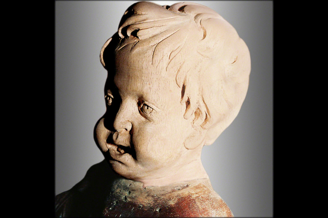 mit Reliefs vom Bildhauer Johann Baptist von StraubErgänzung eines fehlenden „Engelkopfes” für ein Bankhaupt